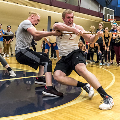 Members of a fraternity compete in the tug-o-war contest in the 2017 Greek Olympics